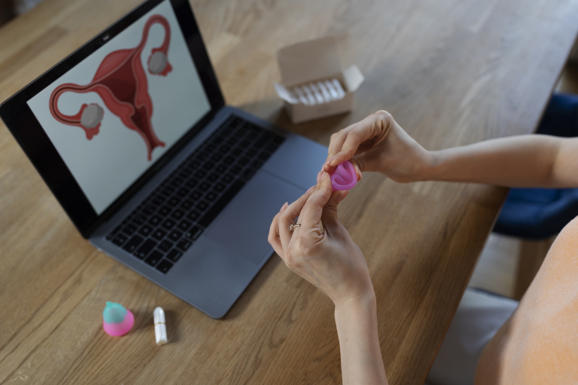 high angle hands folding menstrual cup 23 2149440052